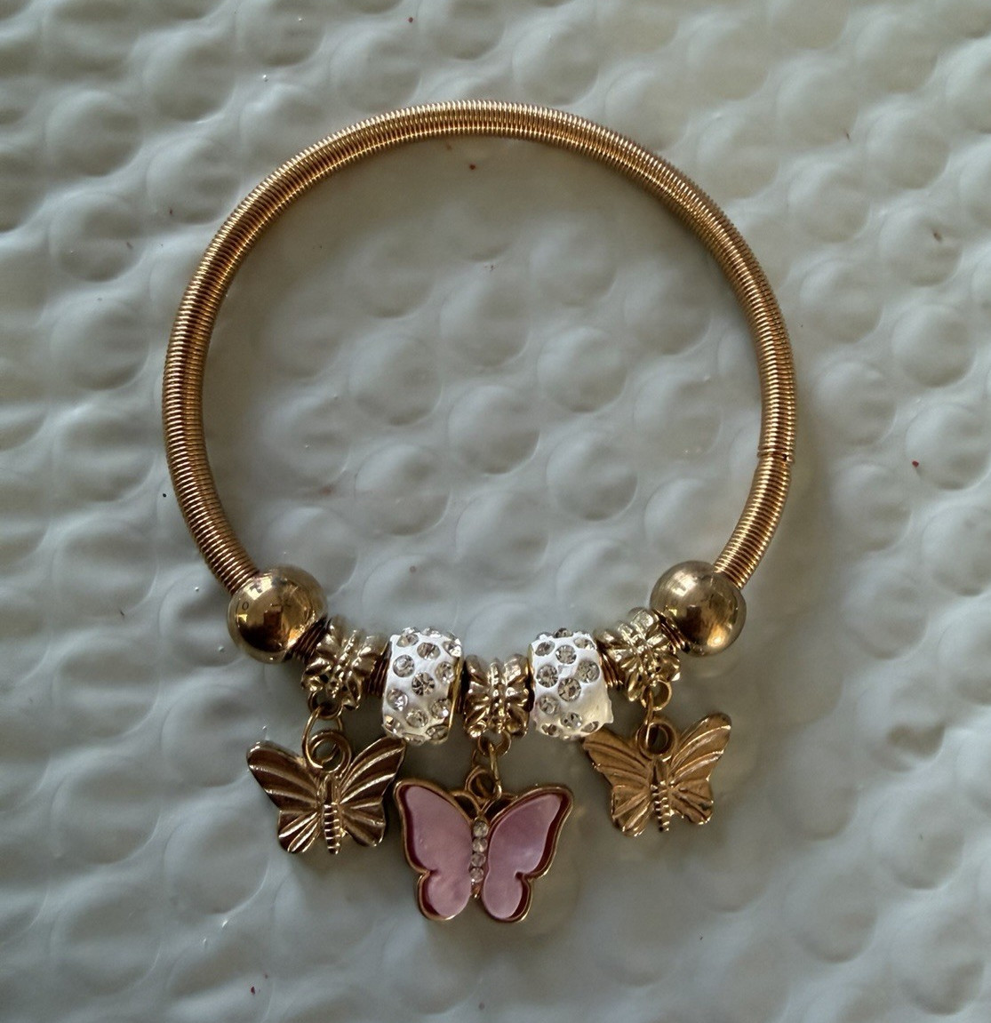 Gold Tone Butterfly Dangle Charm Bangle Bracelet, Pink Enamel No Stone